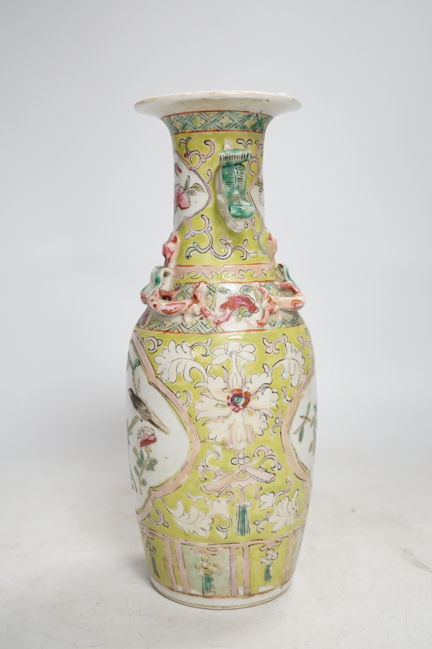 A 19th century Chinese vase, for the Malaysian Straits market, 25cm high. Condition - some minor chips to neck lip, fair